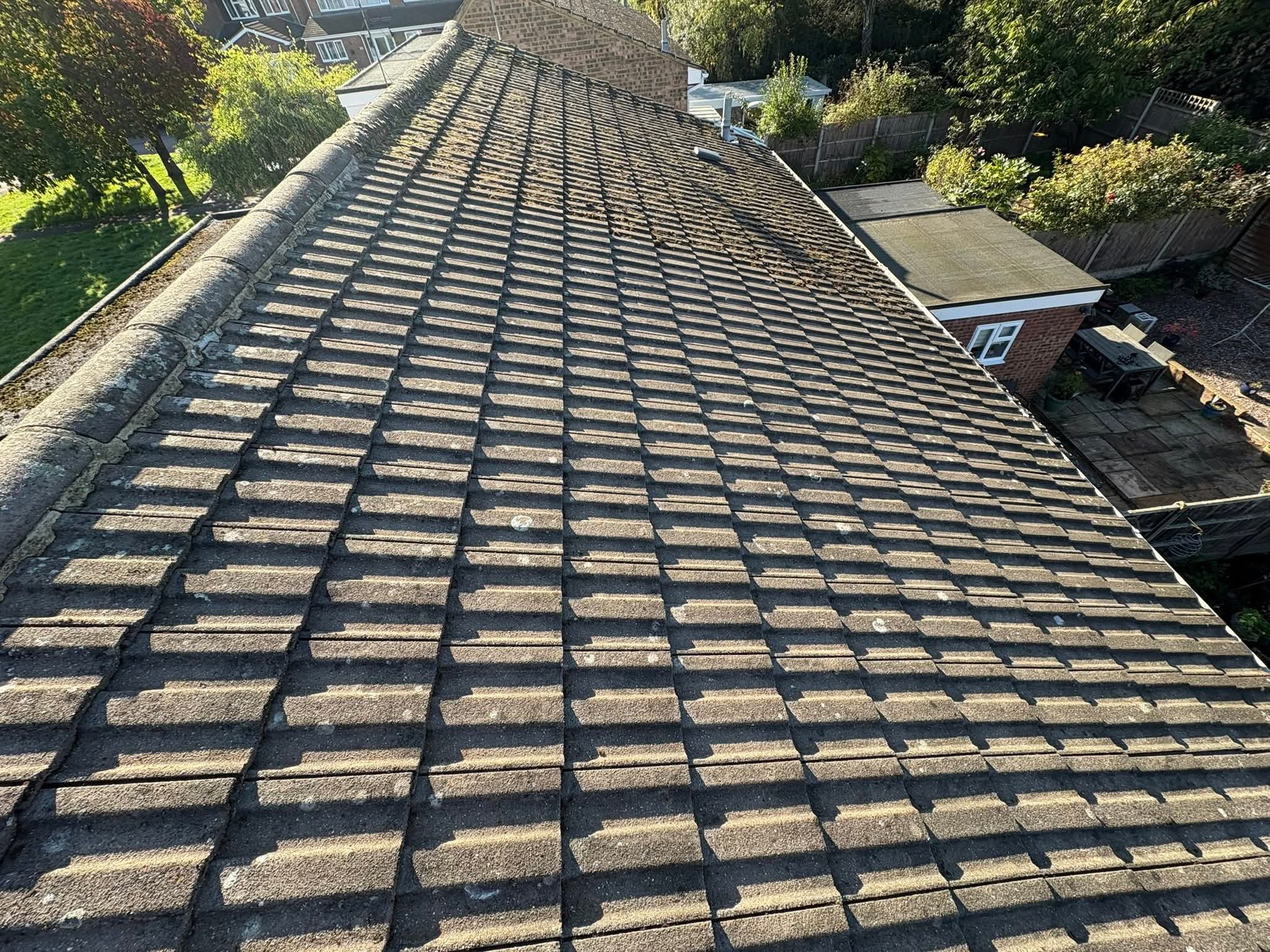 Adjacent flat roof and pitched roof junction